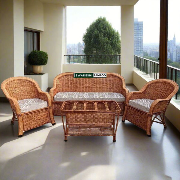 Wicker furniture set with cushions on a white background, featuring the brand 'Swadeshi Bamboo'.